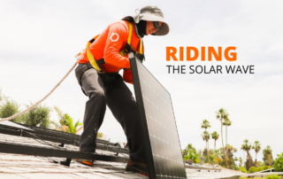 Riding The Solar Wave. Renovian is working instaling solar on a roof.