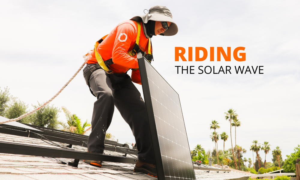 Riding The Solar Wave. Renovian is working instaling solar on a roof.