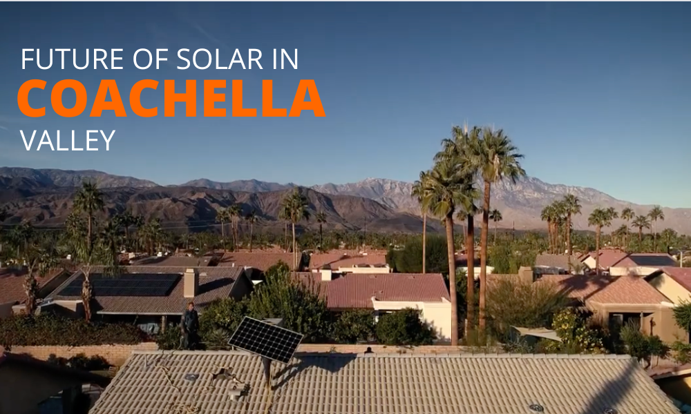 A scenic view of Coachella Valley houses with solar panels on rooftops. Palm trees dot the landscape, and mountains stand in the background under a clear blue sky. Text in the image reads, Future of Solar in Coachella Valley with Coachella in bold orange.