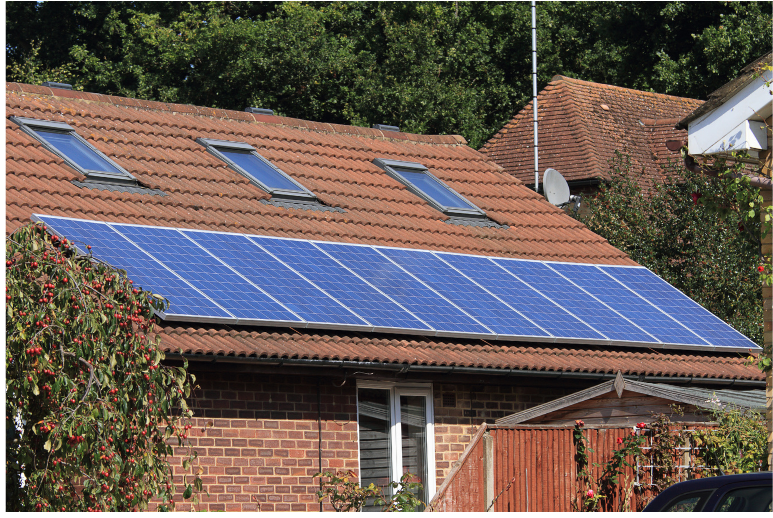 solar panels on the 3edge of a roof of a house