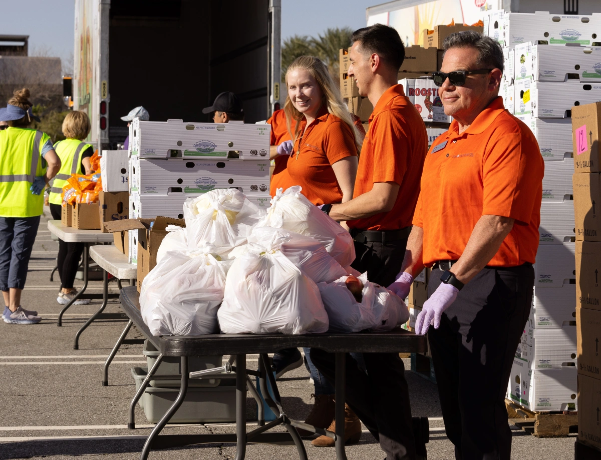 event volunteers helping with donations