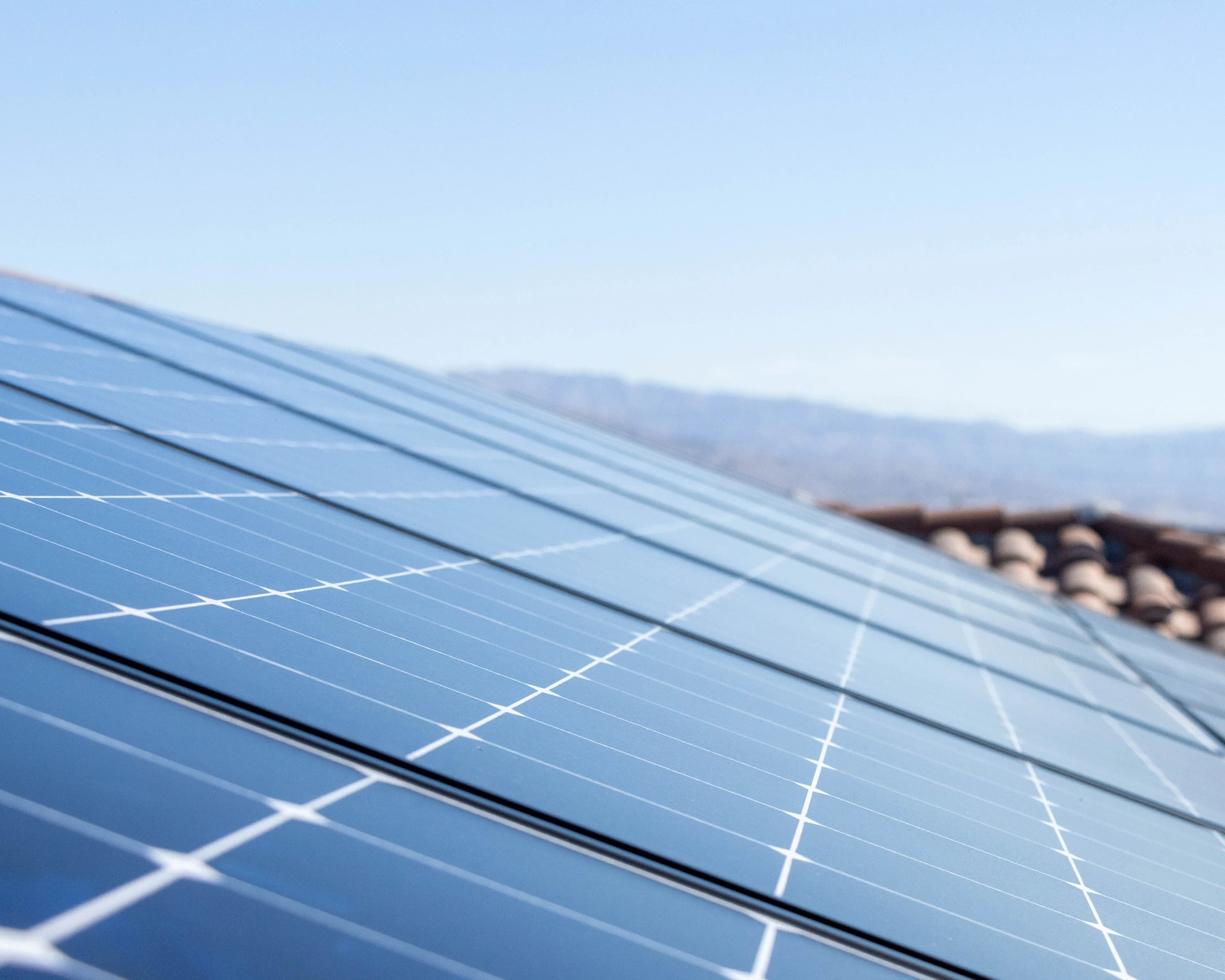 angled view of solar panels on a residential roof