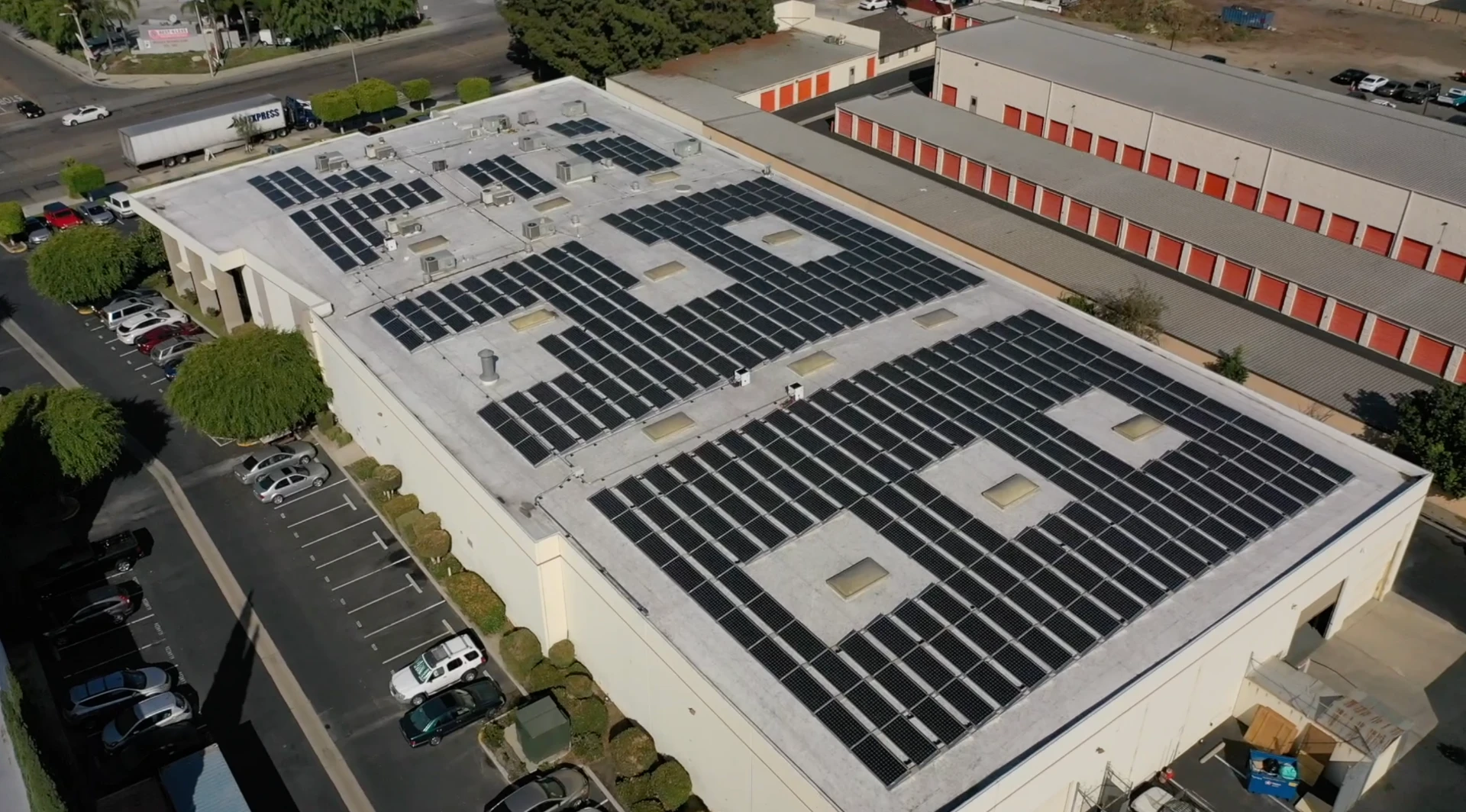 Large facility with solar panels on the roof