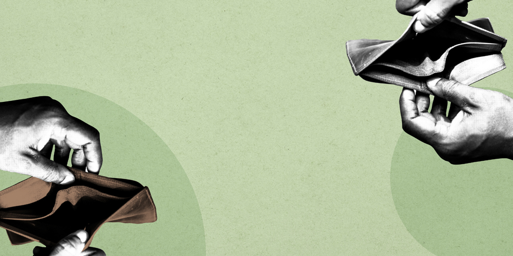Two hands each hold open an empty wallet against a pale green background, symbolizing lack of money or financial hardship.